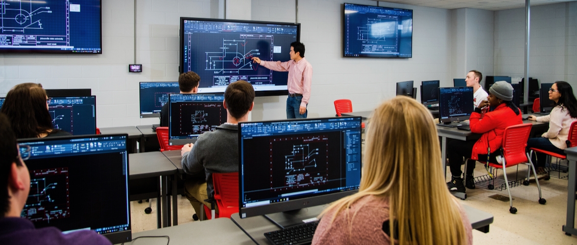 Professor teaching in computer lab